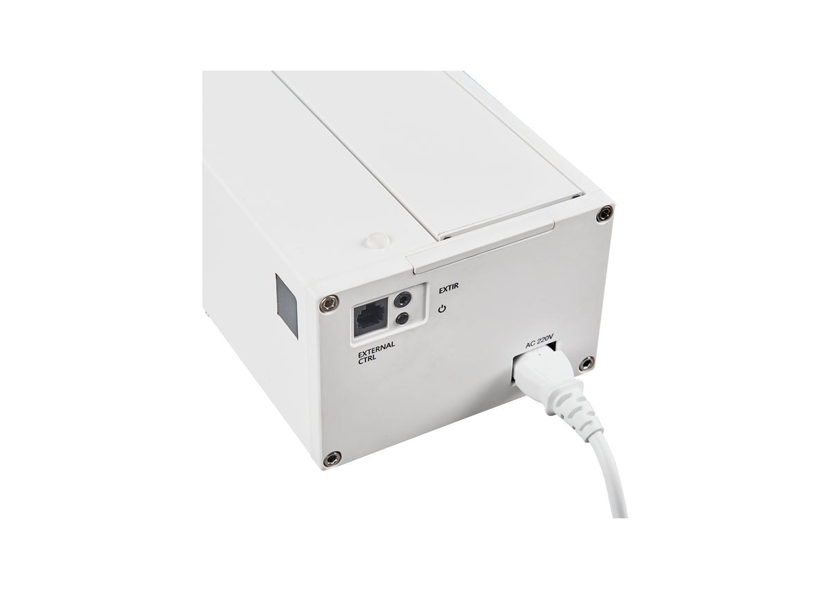 Close-up of the right side view of the celexon HomeCinema V2.0 floor-rising scissor screen in white. Power connection, control buttons, IR, and trigger ports are visible.