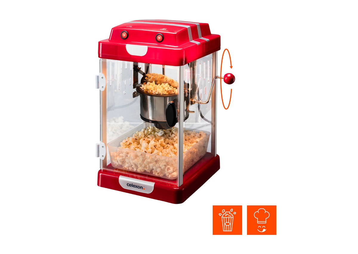 Frontal leicht angeschrägte Ansicht der celexon CinePopCP1000 Popcornmaschine mit Popcorn befüllt und eingezeichneter Rotierungsrichtung des Hebels