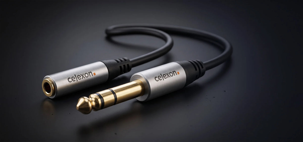 celexon 6.3mm stereo jack to 3.5mm stereo jack M/F audio adapter 0.25m - Professional Line in front of a dark background