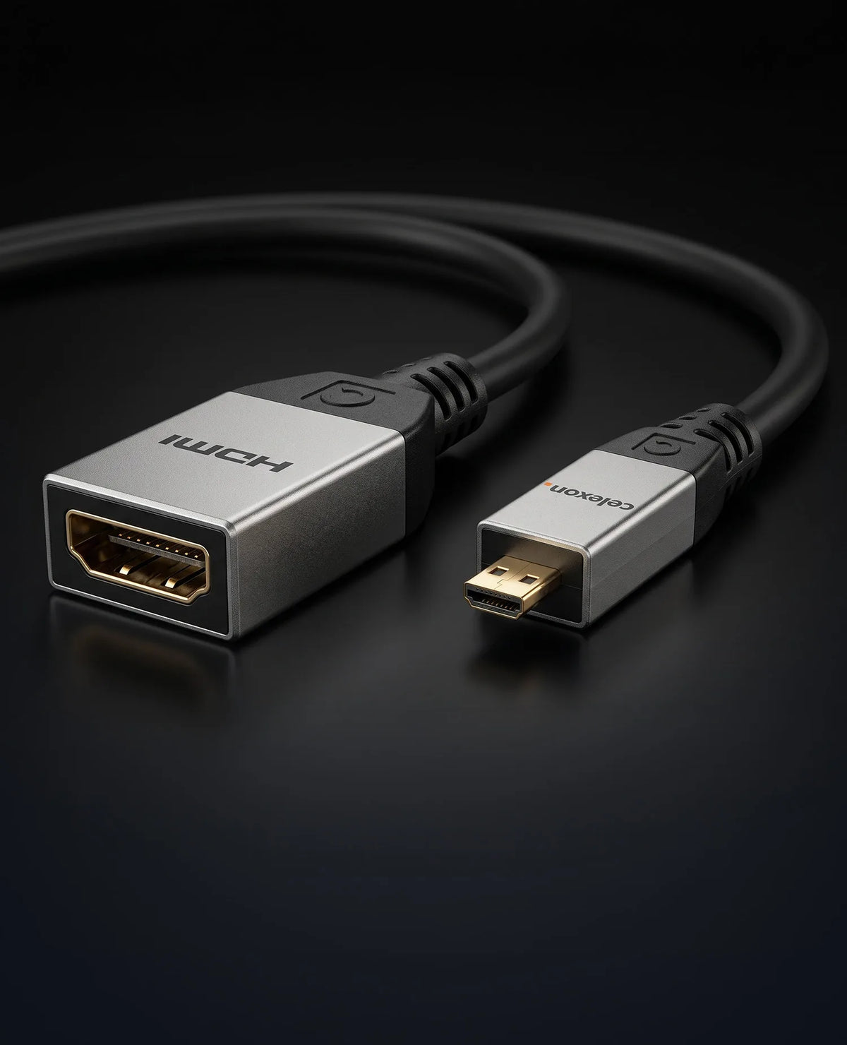 celexon Micro HDMI to HDMI M/F Adapter with Ethernet - 2.0a/b 4K 0.25m - Professional Line in front of a dark background