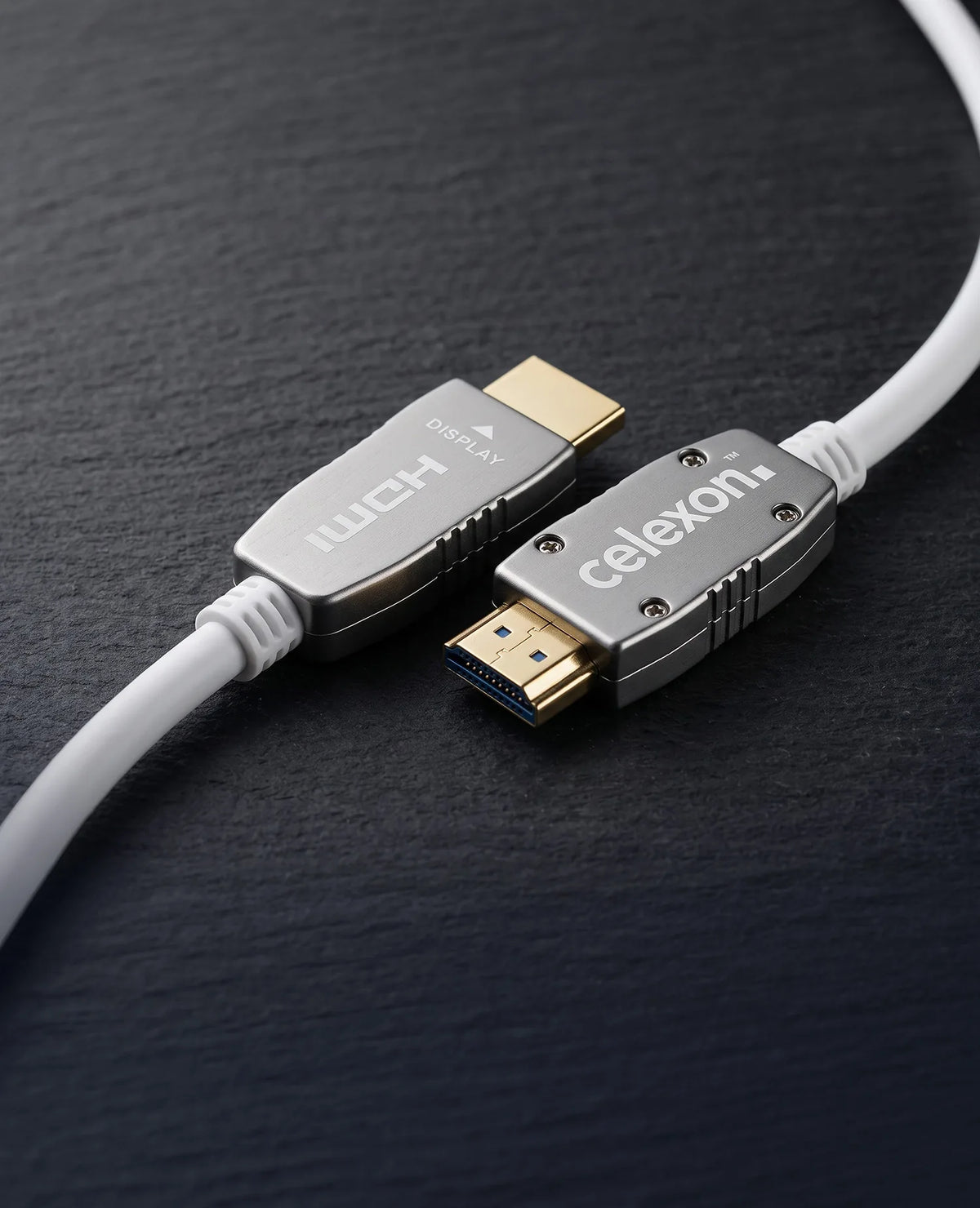 celexon UHD Optical Fibre HDMI 2.0b Active Cable in front of a dark background