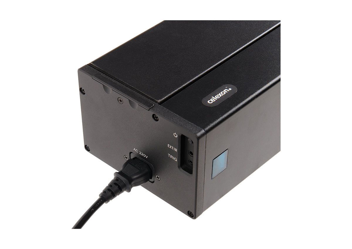 Close-up of the left side view of the celexon HomeCinema Plus floor-rising scissor screen in black. Power connection, control buttons, IR, and trigger ports are visible.