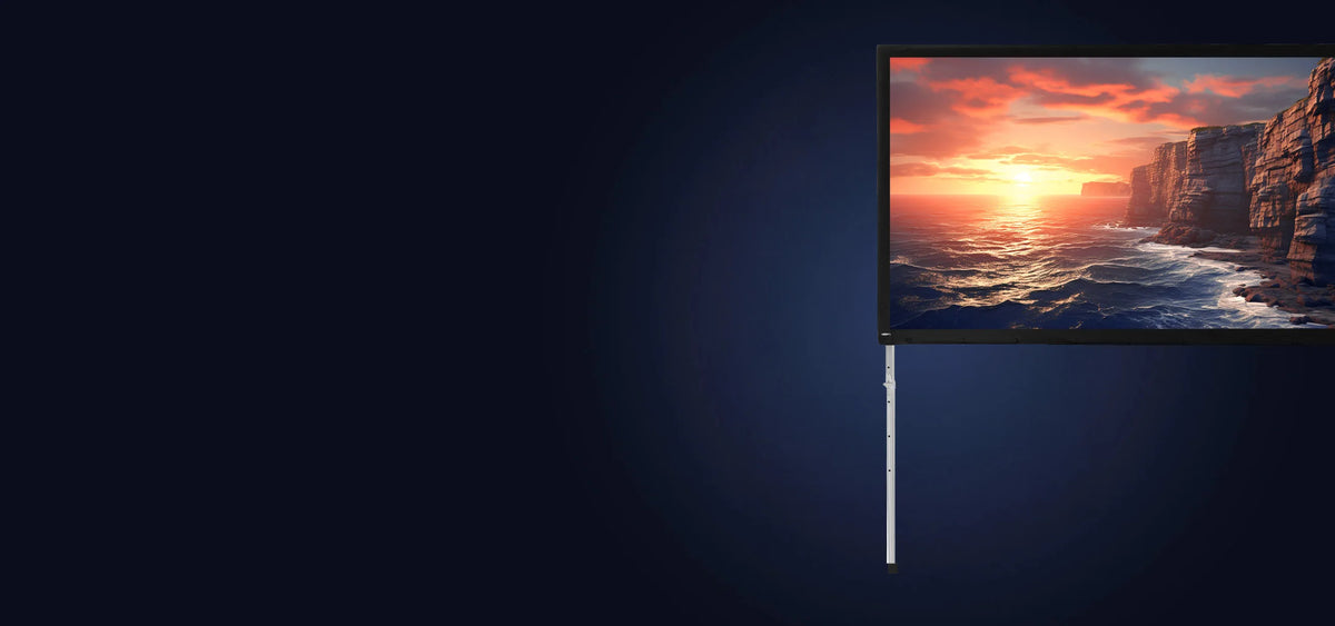 celexon Folding Frame Projector screen showing a projection of a sea coast with cliffs at sunset in front of a dark blue background 