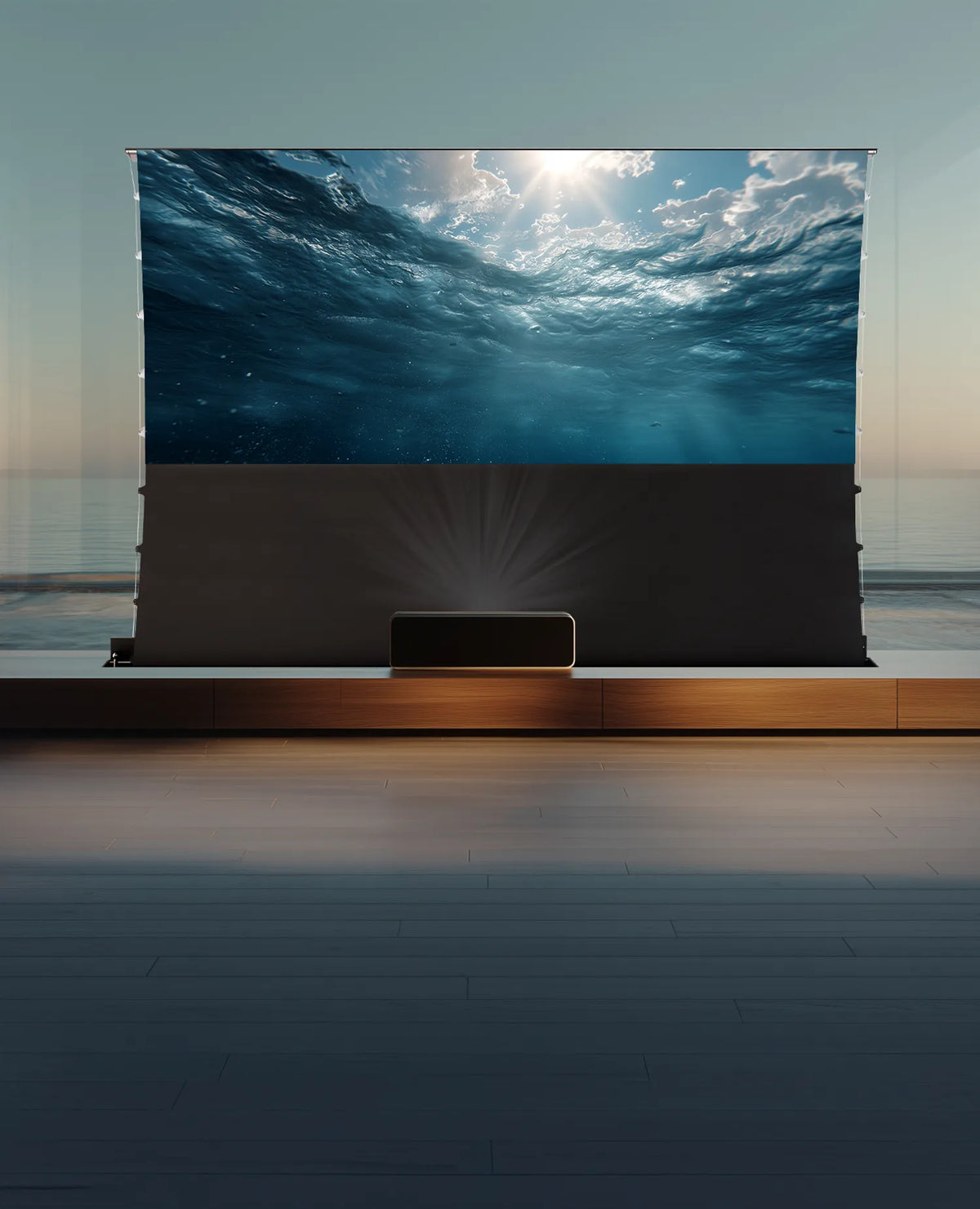 The celexon Expert floor-rising scissor screen integrated into a wooden piece of furniture, with a calm, bright living atmosphere in the background and a view of water. In front of the screen, a UST projector projects an underwater view onto the screen.