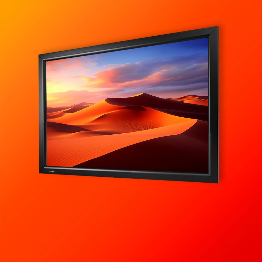 Frontal angled view of a celexon Fixed Frame Projector screen showing a projection of a desert landscape, placed on an orange background
